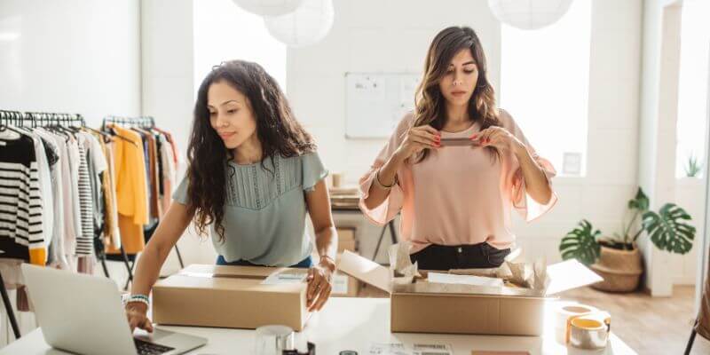 Two women are working in their small business